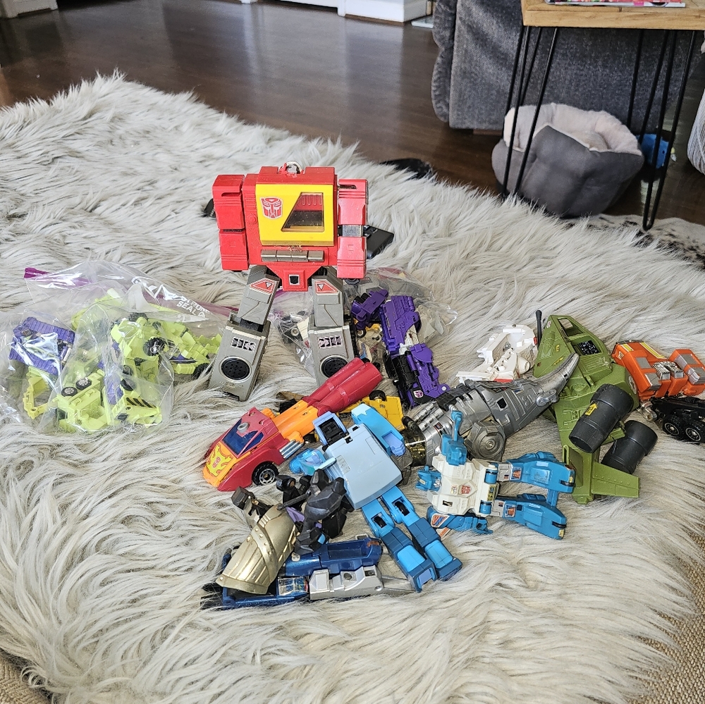Vintage transformers box full of mixed pieces